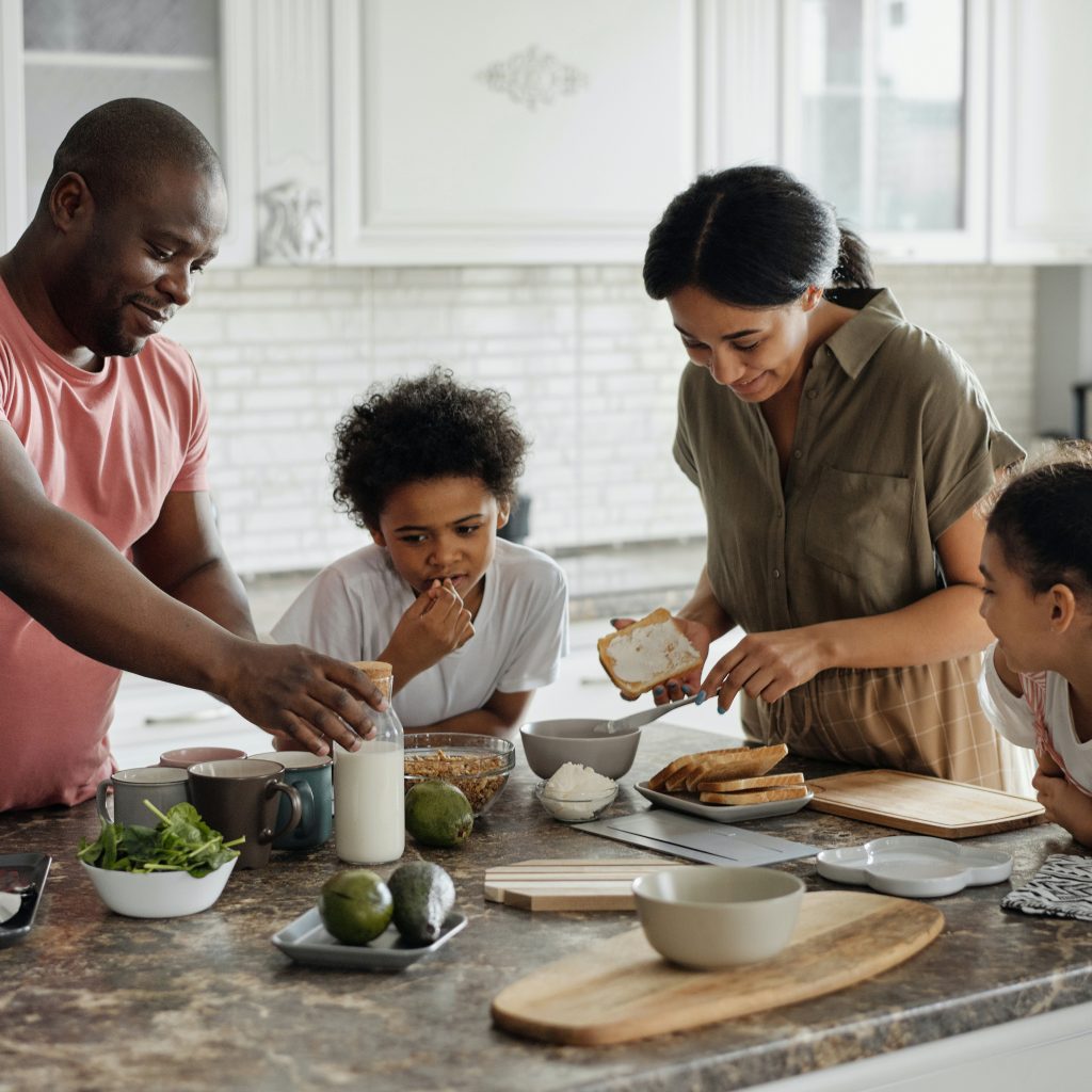 family preparing a healthy meal together